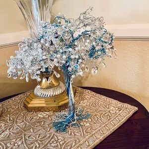 This Angel tree spreads comfort, peace and watches over you.